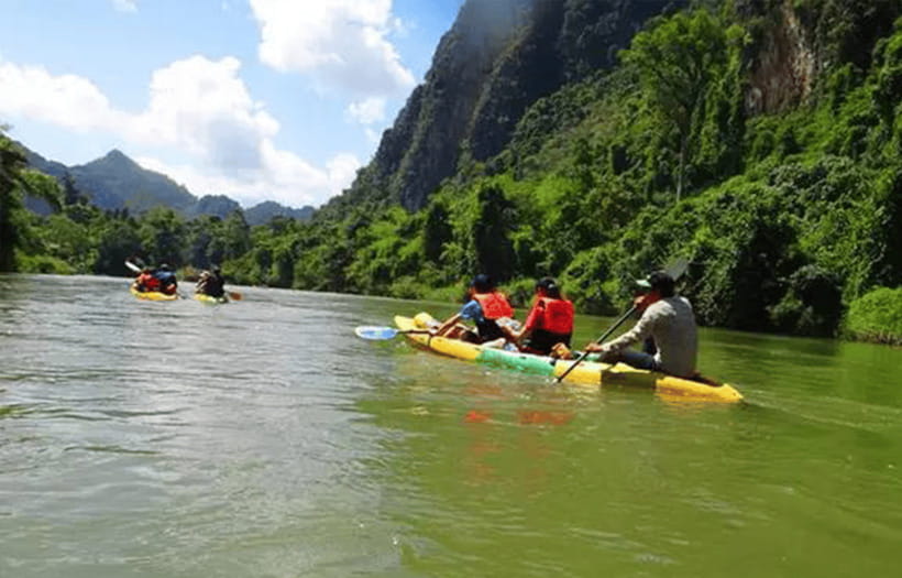 Vang Vieng: Day Tour with Kayaking, Ziplining, and Rafting - Ziplining over forest and river