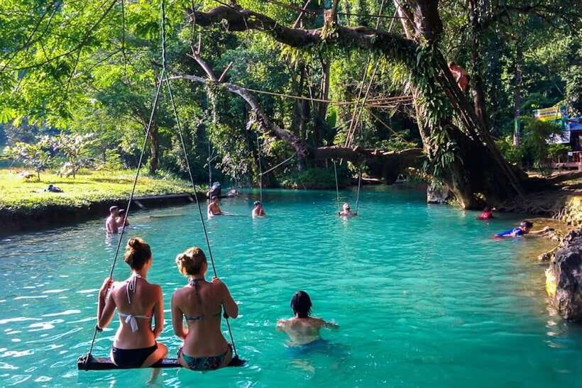 Vang Vieng: Kayaking & Cave Tubing with Zip Line/Blue Lagoon - A banana-leaf picnic beside Phar None Cliff