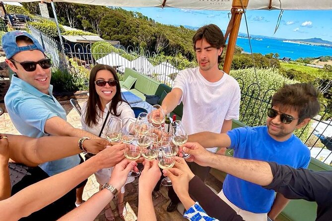 Waiheke Island Day Tour: Ziplining, Wine Tasting & Vineyard Lunch - How the transport and group sizes shape the day