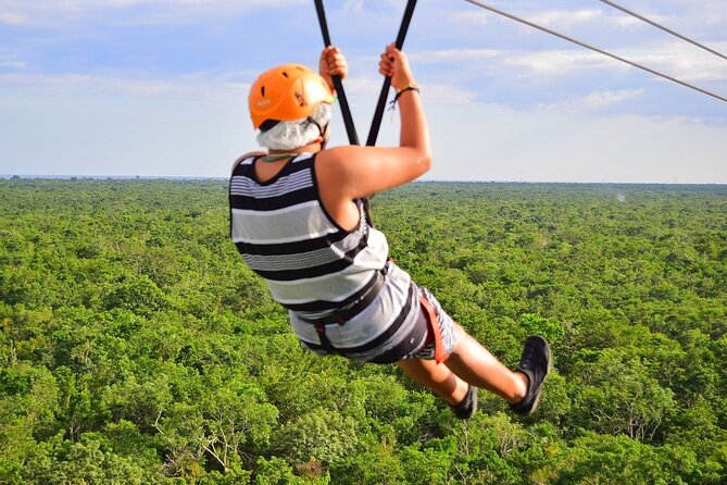 Wild Tulum Day: ATV Tour + Zip Lines + Cenote + Rappel & Lunch! - A cave cenote with a Mayan ceremony