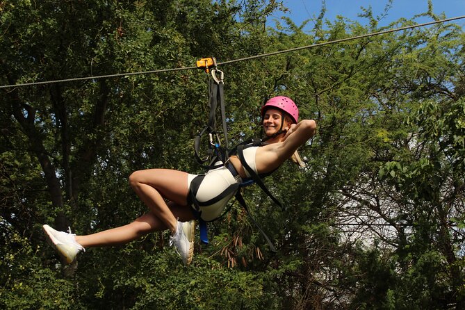 Zip & Dip: Zipline and Wet 'n' Wild Waterpark Combo - Coral Crater starts the day with three zip lines