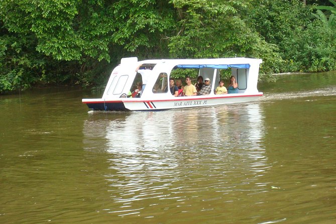 Zipline Canopy Tour & Tortuguero Canal Boat tour. Shore Excursion from Limon - Drifting through the Tortuguero Canal