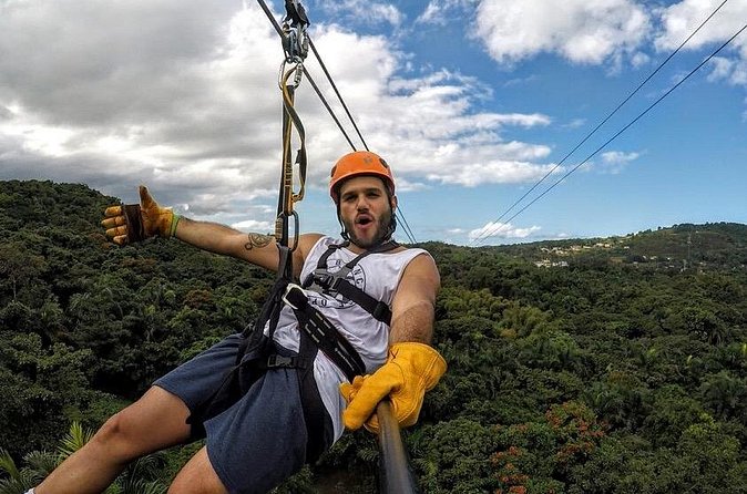 Zipline Canopy Tour with Transport from San Juan - Who should book this rainforest ride