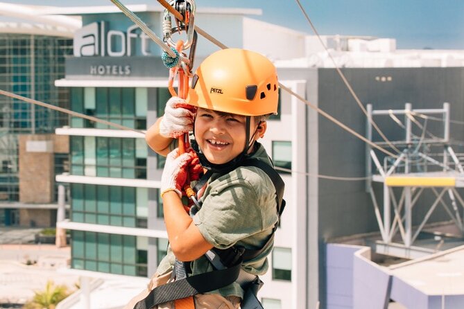 Zipline Sky Bull in Urban Environment in Toroverde urban park San Juan - The lights and screens change the mood