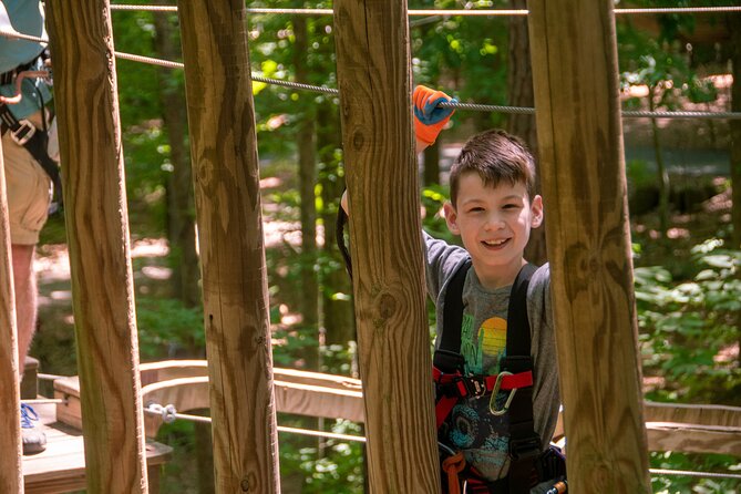 Ziplining and Climbing at The Adventure Park at Virginia Aquarium - Virginia Aquarium’s treetop setting changes the usual zip-line outing