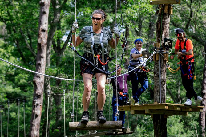 Ziplining and Climbing at The Adventure Park on Cape Cod - The zip lines are part of the route